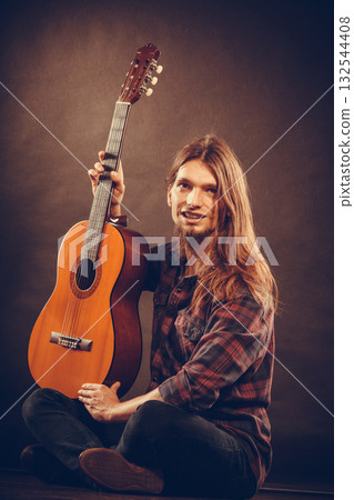 Young guitarist with amazing guitar. 132544408