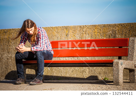 Man outdoor concerned and stressed Man outdoor concerned and stressed 132544411