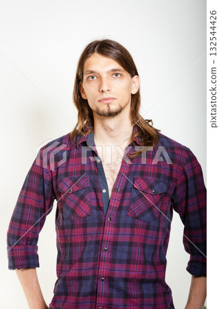 Man in plaid shirt. Man in plaid shirt. 132544426