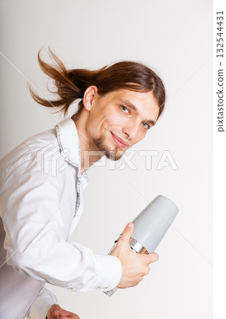 Long haired barman shaking head. Long haired barman shaking head. 132544431