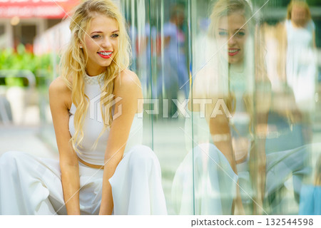 Fashionable woman in city 132544598