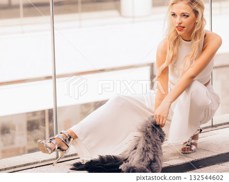 Woman wearing crop top and culottes 132544602