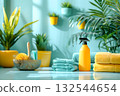 Bright spring cleaning setup with towels, spray bottle, natural brushes, and vibrant green plants in sunlit space. Perfect for ads promoting eco-friendly cleaning products or fresh home inspirations 132544654
