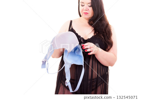 Woman plus size holding bra 132545071