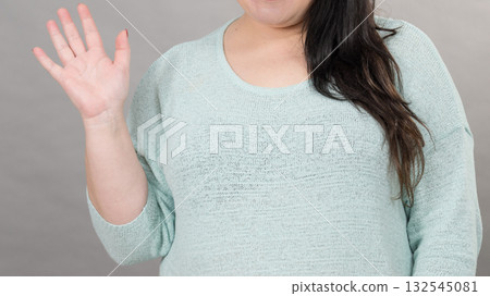 Plus size mature woman in jumper Plus size mature woman in jumper 132545081