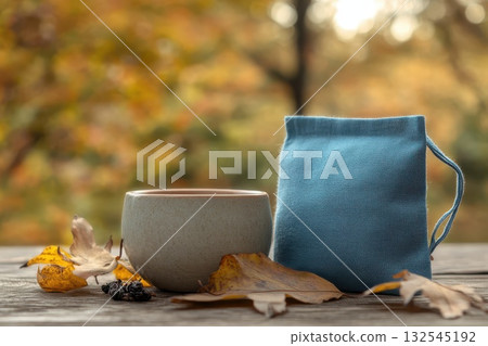 black mug with hot chocolate and marshmallow 132545192