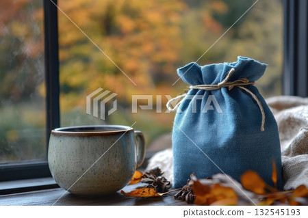 cup of tea and autumn leaves on the window cup of tea and autumn leaves on the window 132545193