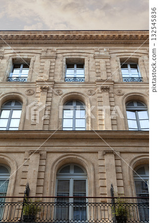 Stoned facade of a stylish building 132545836