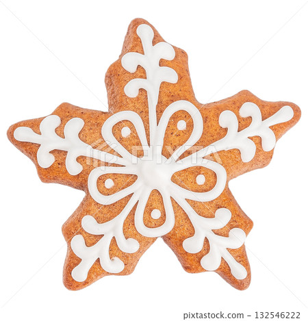 Star-shaped gingerbread cookie decorated with intricate white icing snowflake pattern isolated on white background 132546222