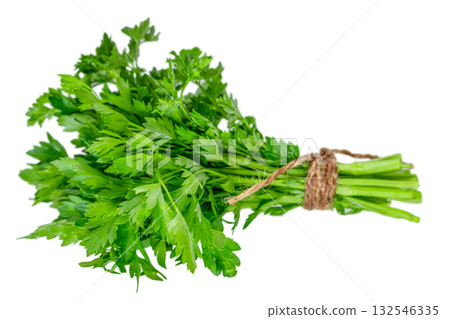 Fresh bunch of parsley tied with rope, isolated on white background. Organic green herb for cooking, garnish, salad, seasoning, and healthy diet ingredient 132546335