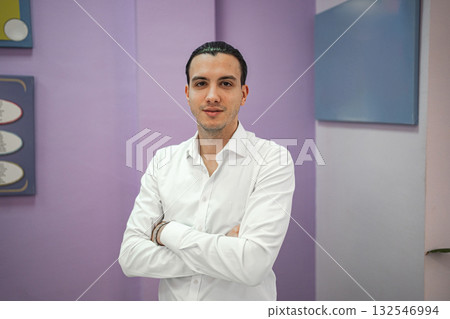 young adult male student in classroom young adult male student in classroom 132546994