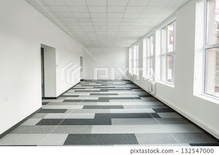 Empty office space With Checkered Floor and Windows Empty office space With Checkered Floor and Windows 132547000
