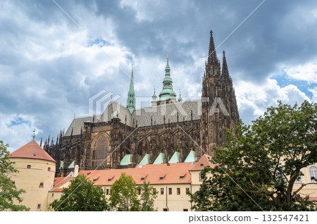 Prague, Czech Republic, August 8, 2023. View of Prague Castle and St. Vitus Cathedral on the hill. Beautiful summer day. Travel destinations. 132547421