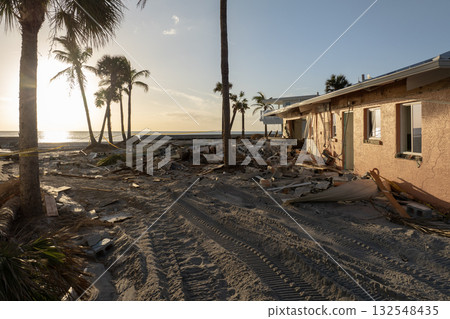 Storm surge severe damage to residential houses on ocean shore after hurricane landfall. Natural disaster consequences in Florida 132548435