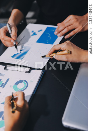 Accounting company provide finance and taxation planning for profitable cash flow, Auditor and accountant team working in office, analyze financial data and accounting record with calculator.Insight Accounting company provide finance and taxation planning for profitable cash flow, Auditor and accountant team working in office, analyze financial data and accounting record with calculator.Insight 132548468