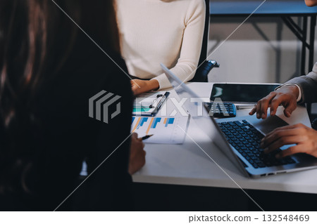 Accounting company provide finance and taxation planning for profitable cash flow, Auditor and accountant team working in office, analyze financial data and accounting record with calculator.Insight Accounting company provide finance and taxation planning for profitable cash flow, Auditor and accountant team working in office, analyze financial data and accounting record with calculator.Insight 132548469
