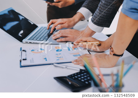 Accounting company provide finance and taxation planning for profitable cash flow, Auditor and accountant team working in office, analyze financial data and accounting record with calculator.Insight 132548509