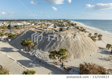 Sand recipient site for residents to dump sand after hurricane Milton storm surge. Huge sand piles at Englewood Beach on Manasota Key. Natural disaster aftermath cleanup 132548615