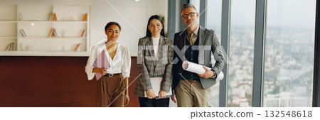 Exploring Business Team Collaboration in a Modern Office Space for Enhanced Productivity and Growth Exploring Business Team Collaboration in a Modern Office Space for Enhanced Productivity and Growth 132548618