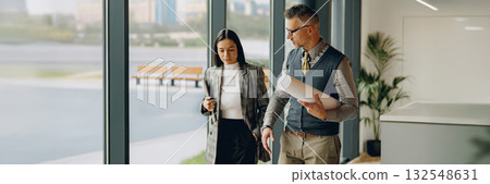 Engaging Business Meeting in a Modern Office Space with Highly Professional Colleagues Present 132548631