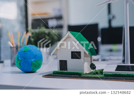 Group of businesspeople in team brainstorm meeting discussion on ESG (Environmental, social, corporate governance) organization planning. Sustainable business, coworker people teamwork. Close up Group of businesspeople in team brainstorm meeting discussion on ESG (Environmental, social, corporate governance) organization planning. Sustainable business, coworker people teamwork. Close up 132548682