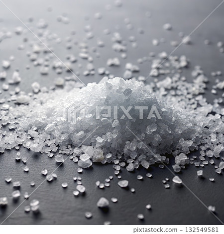 A Pile Of White Salt Crystals On A Gray Surface. Generative AI 132549581
