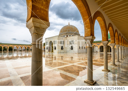 Mausoleum of Habib Bourguiba on a cloudy day with decorated marble courtyard, Monastir 132549665