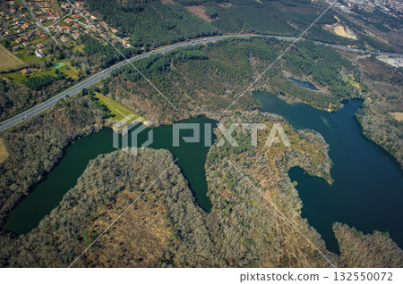 Scenic aerial view of Etang d'Yrieux and nearby landscapes in Ondres 132550072