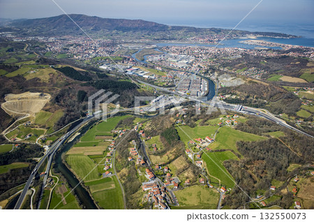 Scenic view of Peage Biriatou and Hendaye from above with green landscapes 132550073