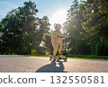 Scooter outdoor. Child play park nature. Toddler balance wheels road. 132550581