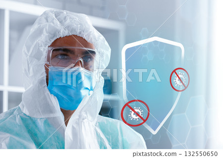 Medical professional in protective gear examines virus prevention measures indoors 132550650