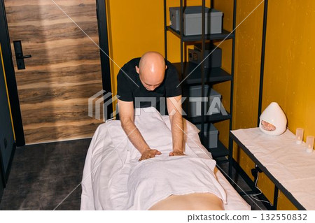 Enjoy a Professional Massage Therapy Session in a Calm Setting for Relaxation and Rejuvenation Enjoy a Professional Massage Therapy Session in a Calm Setting for Relaxation and Rejuvenation 132550832