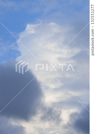 Large, somewhat solidified clouds (vertical photo) Large, somewhat solidified clouds (vertical photo) 132551277
