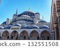 Blue Mosque (Sultanahmet) inner courtyard with domes, minarets and arched colonnades, Istanbul, Turkey - architectural landmark for travel and cultural content 132551508