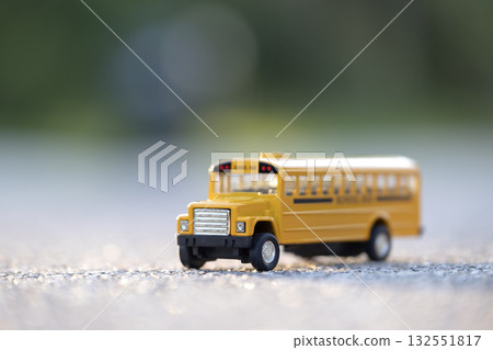 Little model of american yellow school bus outdoor. Concept of education safety in the USA Little model of american yellow school bus outdoor. Concept of education safety in the USA 132551817