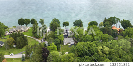 Large waterfront private homes in Rochester, NY residential area on lakeside Ontario. New family houses as example of real estate development in American suburbs 132551821