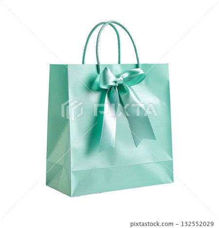 Isolated mint paper bag decorated with satin ribbon on white background 132552029