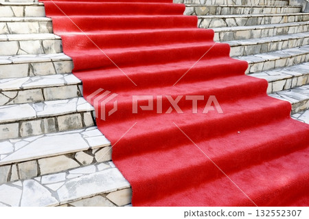 A staircase with a red carpet. A symbolic image of ceremonies, events, VIP, rise and success. 132552307