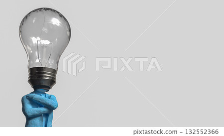 The Blue Business man and light bulb for Idea or creative concept 3d Rendering. The Blue Business man and light bulb for Idea or creative concept 3d Rendering. 132552366