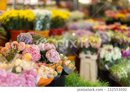 Assortment of bouquets of flowers for sale in store 132553092