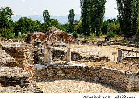 Sunlit stone ruins of Heraclea Lyncestis near Bitola, North Macedonia Sunlit stone ruins of Heraclea Lyncestis near Bitola, North Macedonia 132553132