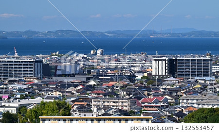 Omura City (Nagasaki Prefecture / after construction of Shin-Omura Station) Hario Radio Tower and Saikai Bridge (Sasebo) in the distance 132553457