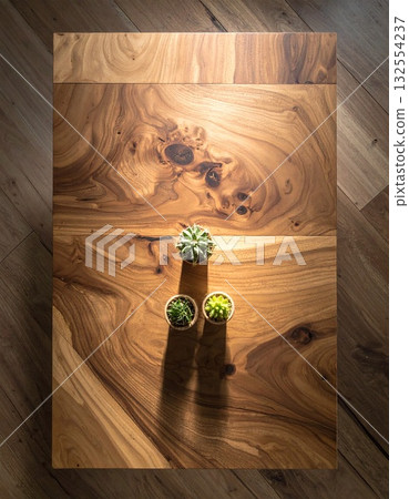 A wooden table with soft light streaming in A wooden table with soft light streaming in 132554237
