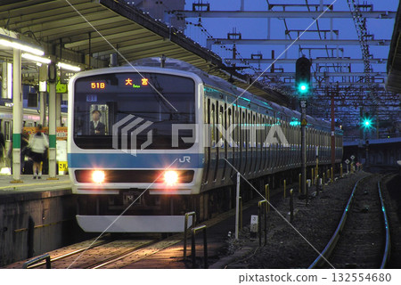 Keihin-Tohoku Line 209 series 500 train parked at Urawa Station, where elevated tracks are currently under construction (June 2006) Keihin-Tohoku Line 209 series 500 train parked at Urawa Station, where elevated tracks are currently under construction (June 2006) 132554680