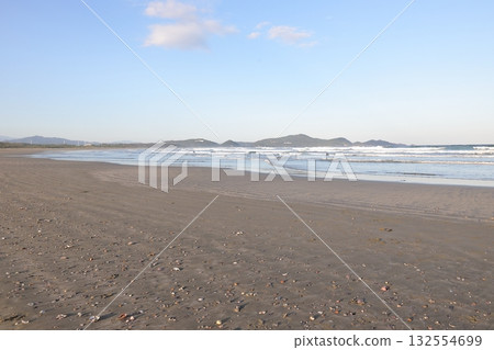 Sandy beach and blue sea 132554699