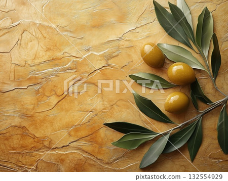 Olive branch with glossy green leaves and ripe yellow olives on textured golden background, showcasing natural beauty and organic elements in a harmonious composition Olive branch with glossy green leaves and ripe yellow olives on textured golden background, showcasing natural beauty and organic elements in a harmonious composition 132554929
