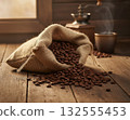 A cafe-style background with a warm atmosphere and roasted coffee beans spilling out of a burlap sack 132555453