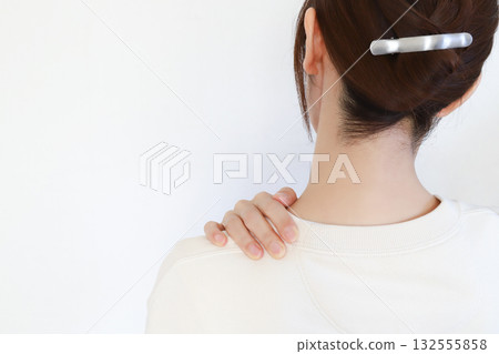 Woman with stiff shoulders, fatigue image Woman with stiff shoulders, fatigue image 132555858