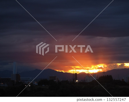 Cressus rays stretching from the sun setting over the Kanto Mountains Cressus rays stretching from the sun setting over the Kanto Mountains 132557247
