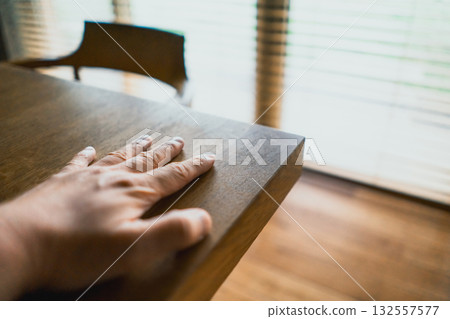 Touch the dining table Touch the dining table 132557577